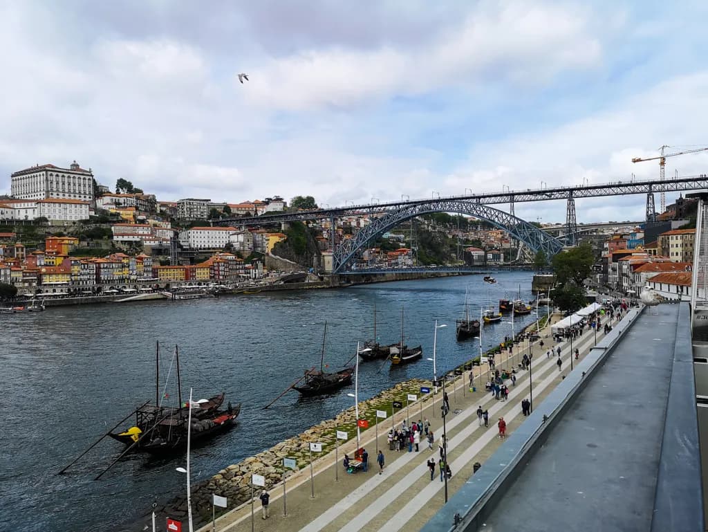 Picture of downtown porto side street with a spanish colored buildings.