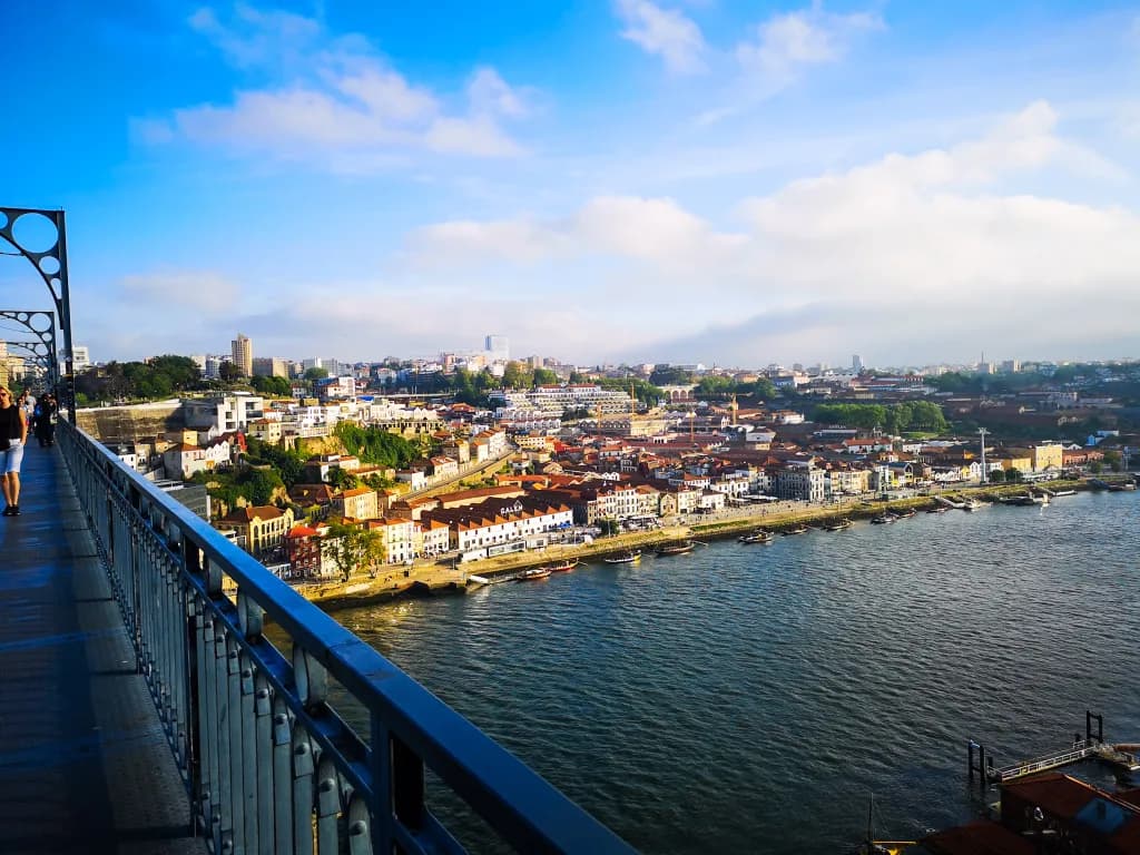 Picture of downtown porto streets with an old gothic church.