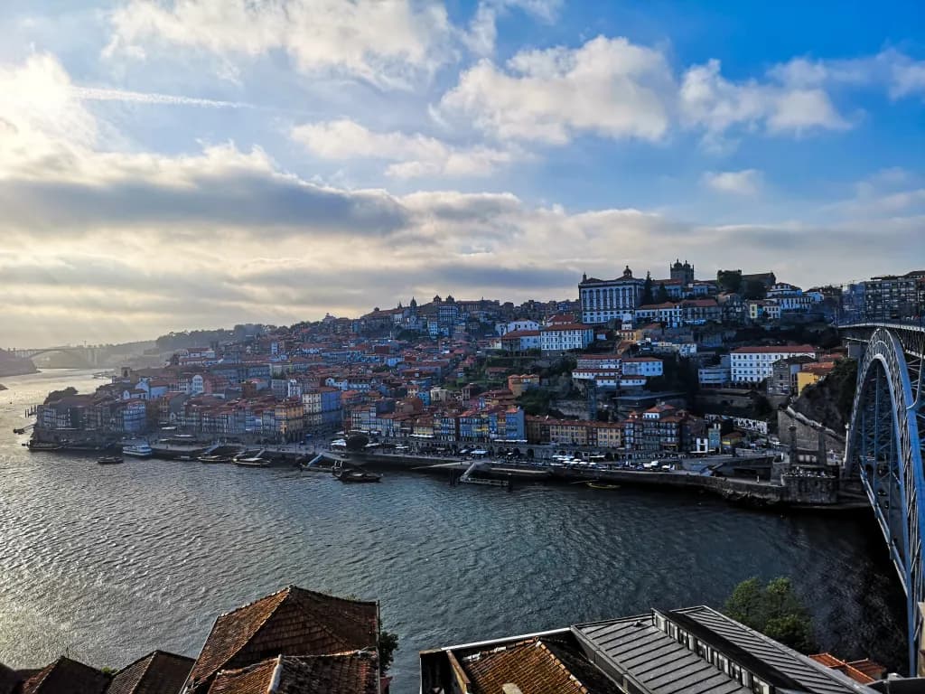 Picture of downtown porto side street with a spanish colored buildings.